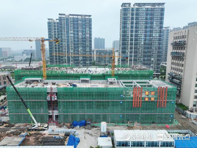 CQ9电子北方首个新增国际通信枢纽中国联通青岛国际局通信枢纽楼全面封顶(图2)
